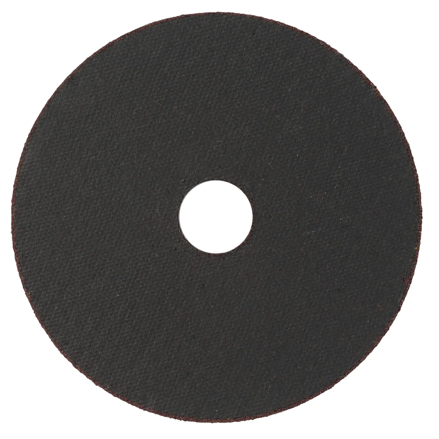 A close-up view of a black circular abrasive cutting disc with a central hole, commonly used with power tools for cutting metal or other materials.